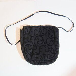 Beautiful, supremely elegant foldover shoulder bag with designs